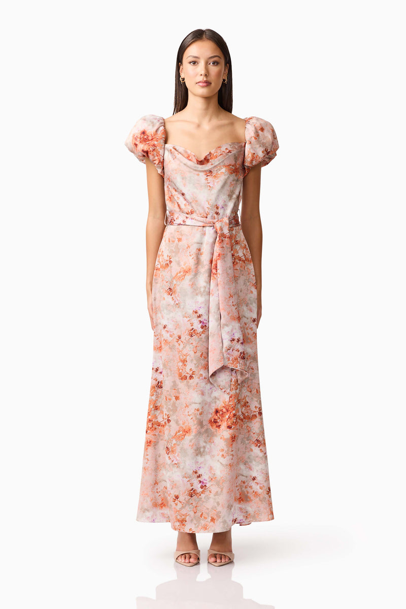 Brunette model wearing the Piper Puff Sleeve Maxi Dress in Orange Floral Front Shot