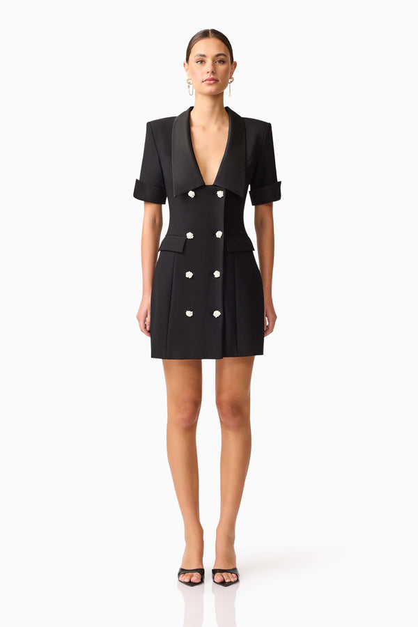Brunette model wearing Ruby Short Sleeve Blazer Dress in Black front shot