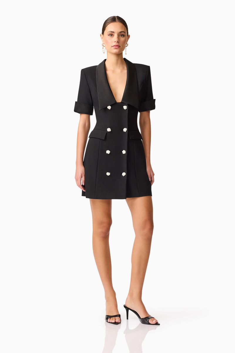 Brunette model wearing Ruby Short Sleeve Blazer Dress in Black posed shot