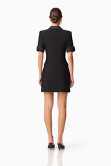 Brunette model wearing Ruby Short Sleeve Blazer Dress in Black back shot