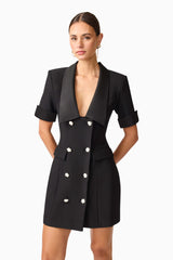 Brunette model wearing Ruby Short Sleeve Blazer Dress in Black close up shot
