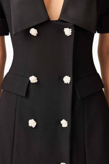 Brunette model wearing Ruby Short Sleeve Blazer Dress in Black detail shot