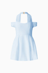 Brunette model wearing Ruby Halter Mini Dress in Blue ghost shot 