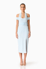Brunette model wearing the Ruby Halter Midi Dress in Blue front shot