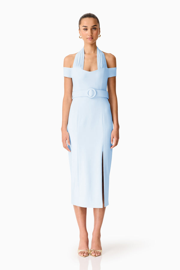 Brunette model wearing the Ruby Halter Midi Dress in Blue front shot