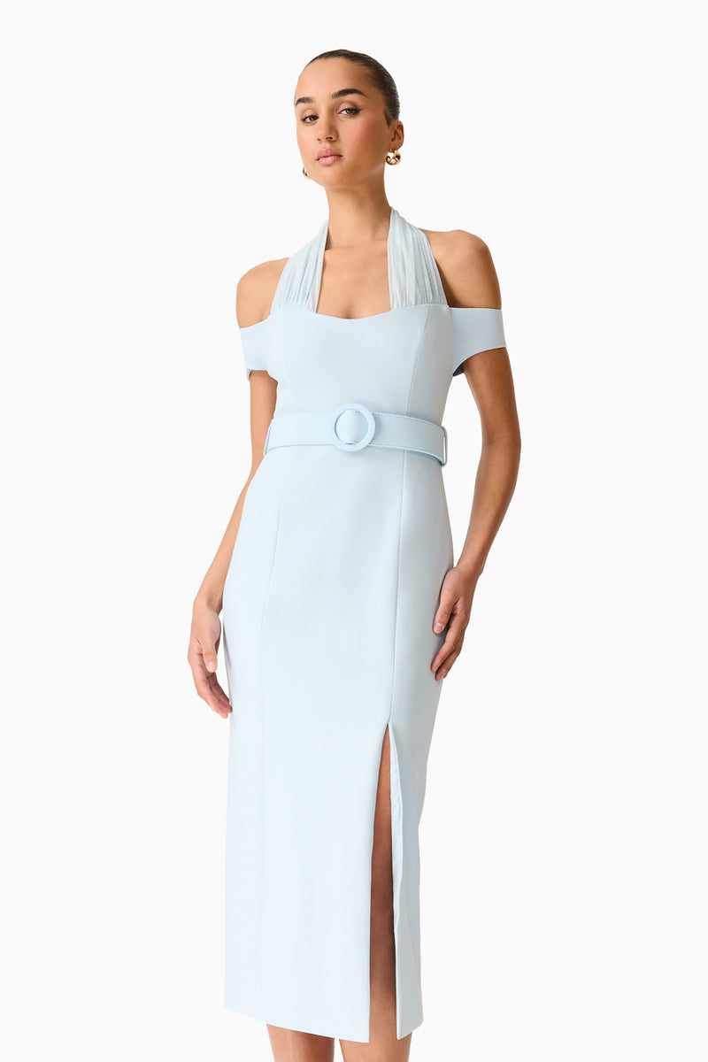 Brunette model wearing the Ruby Halter Midi Dress in Blue close up posed shot