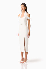 Brunette model wearing the Ruby Halter Midi Dress in White side Shot