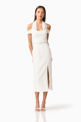 Brunette model wearing the Ruby Halter Midi Dress in White Posed Shot