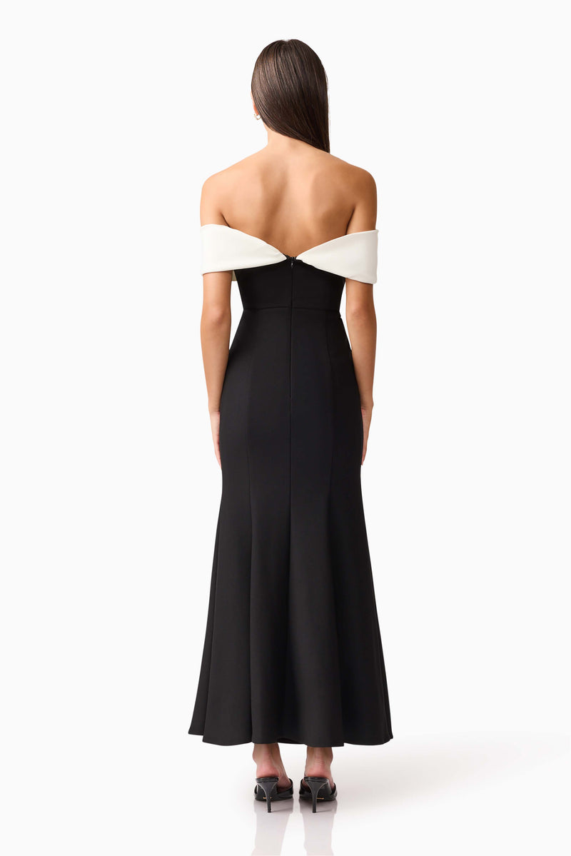 Brunette model wearing Ruby Off The Shoulder Gown in Black back shot