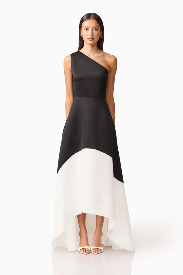 Brunette model wearing Sorrel One Shoulder Gown in Black & White front shot