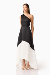 Brunette model wearing Sorrel One Shoulder Gown in Black & White side shot