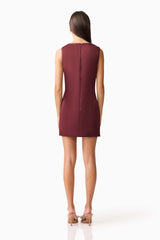 Brunette model wearing Livia Shift Mini Dress in Red back shot