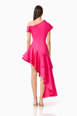 Brunette model wearing the Livia Asymmetrical Gown in Pink back shot