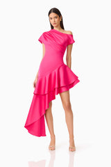 Brunette model wearing the Livia Asymmetrical Gown in Pink posed shot