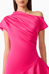 Brunette model wearing the Livia Asymmetrical Gown in Pink detail shot