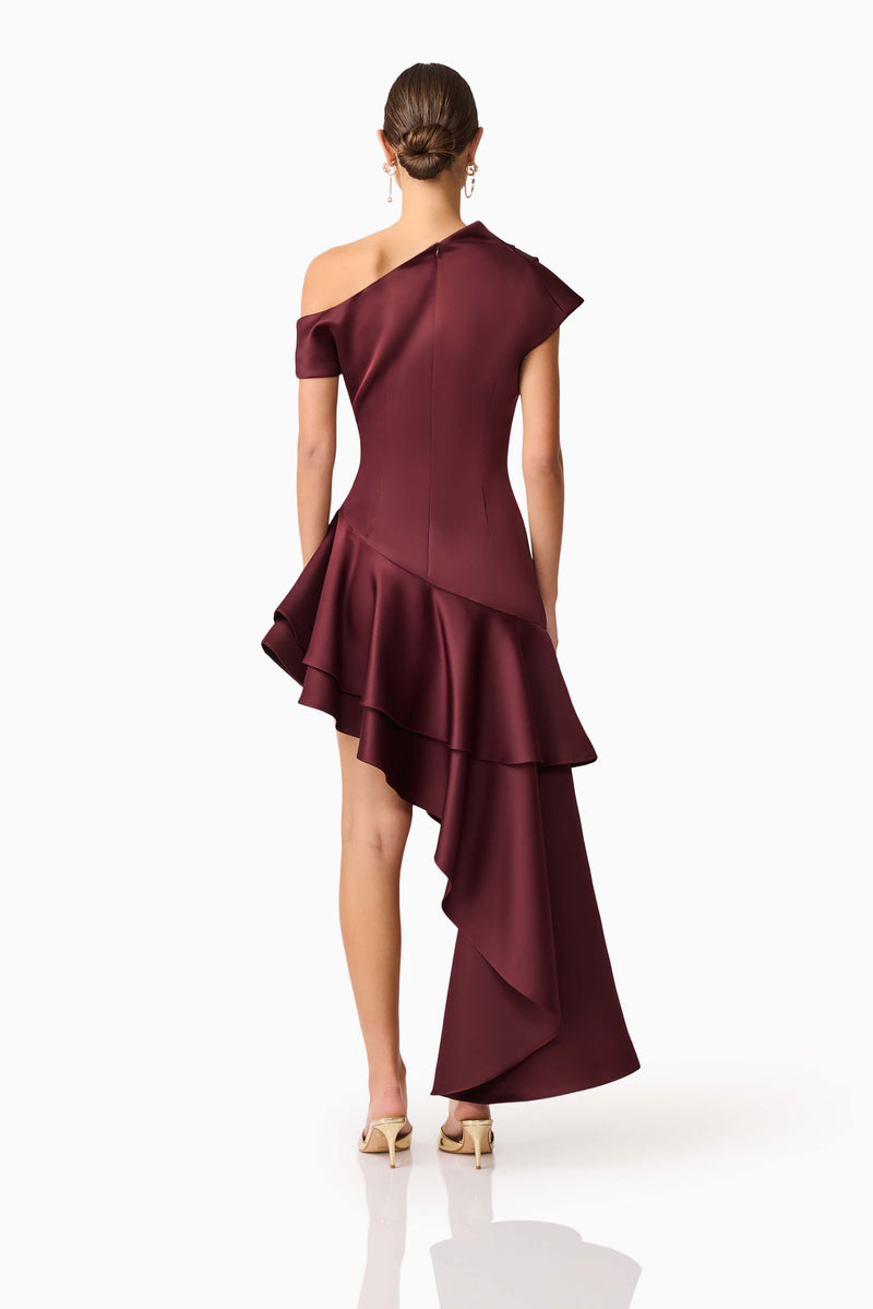 Brunette model wearing Livia Asymmetrical Gown in Red back shot
