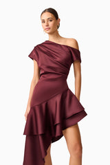 Brunette model wearing Livia Asymmetrical Gown in Red close up posed shot
