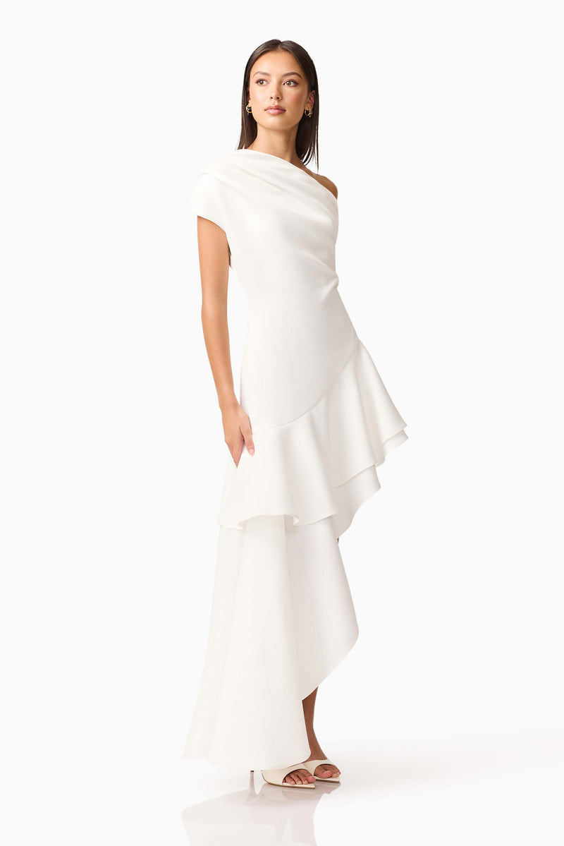 Brunette model wearing Livia Asymmetrical Gown in White posed shot
