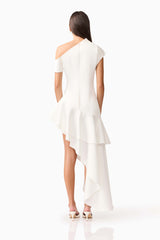 Brunette model wearing Livia Asymmetrical Gown in White back shot