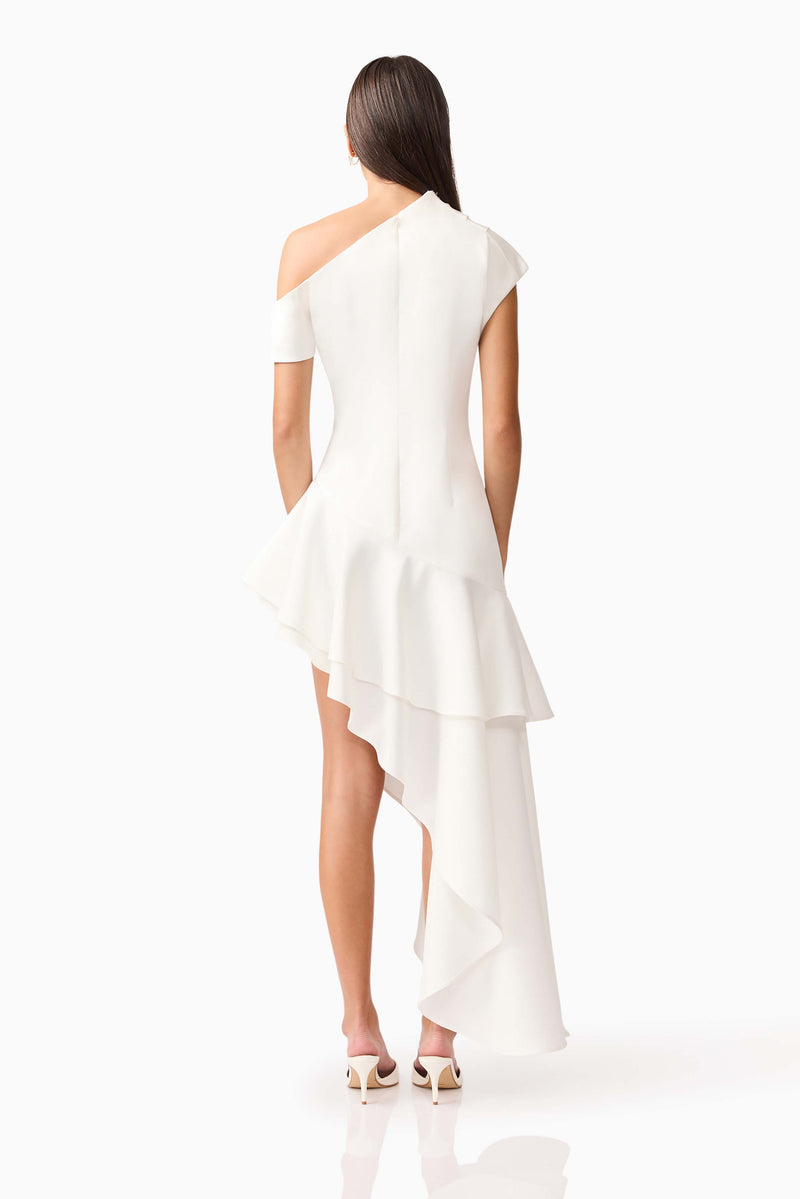 Brunette model wearing Livia Asymmetrical Gown in White back shot