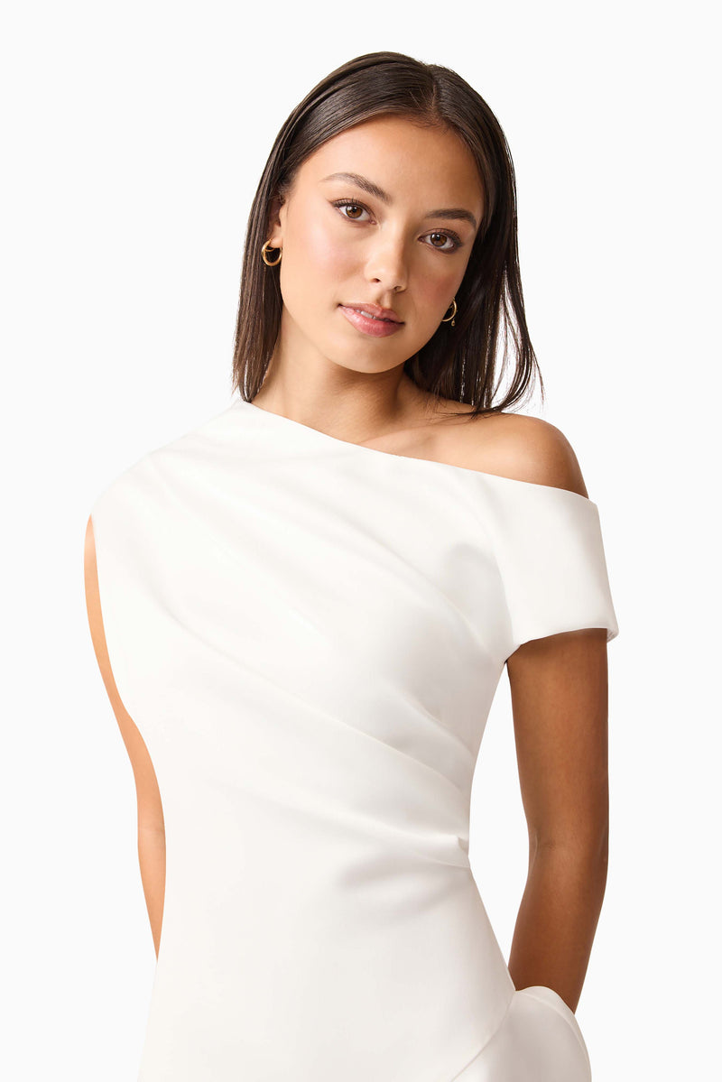 Brunette model wearing Livia Asymmetrical Gown in White close up shot