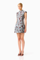 Bloomia Tulip Mini Dress in Brown & Blue Floral with a high neckline and sleeveless design side shot