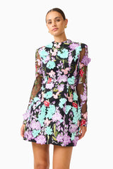 Veloria Long Sleeve Mini Dress in Black & Pastel Floral with a high neckline close up shot 