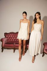 Model wears the Blossia Embellished Mini Dress in White to bridal shower