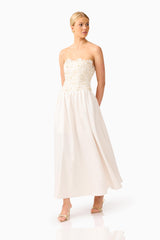 Blossia Embellished Gown in White with strapless neckline posed looking away shot
