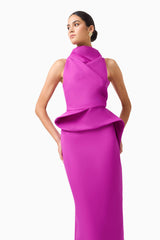 Lioris Peplum Gown in Purple sleeveless high neckline posed close up hands on hips shot