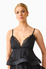 Bellini Tiered Maxi Dress in Black Polkadot with V neckline and spaghetti straps close up shot