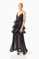 Bellini Tiered Maxi Dress in Black Polkadot with V neckline and spaghetti straps side posed shot