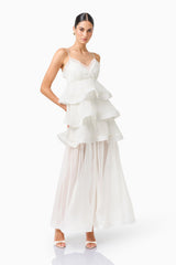 Bellini Tiered Maxi Dress in White Polkadot with V neck and spaghetti straps posed shot