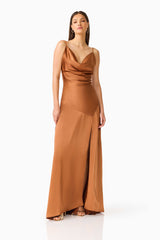 Brunette model wearing the Clementine Cowl Neck Gown in Brown posed shot 