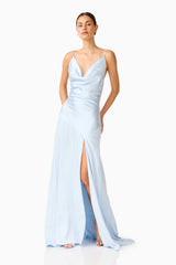 Brunette model wearing the Clementine Cowl Neck Gown in Pale Blue posed shot 