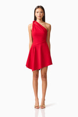 Brunette model wearing the Lila Asymmetrical Mini Dress in Red Front shot