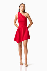 Brunette model wearing the Lila Asymmetrical Mini Dress in Red posed shot