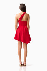 Brunette model wearing the Lila Asymmetrical Mini Dress in Red back shot