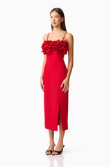 Brunette model wearing the Lila Fitted Midi Dress in Red side shot