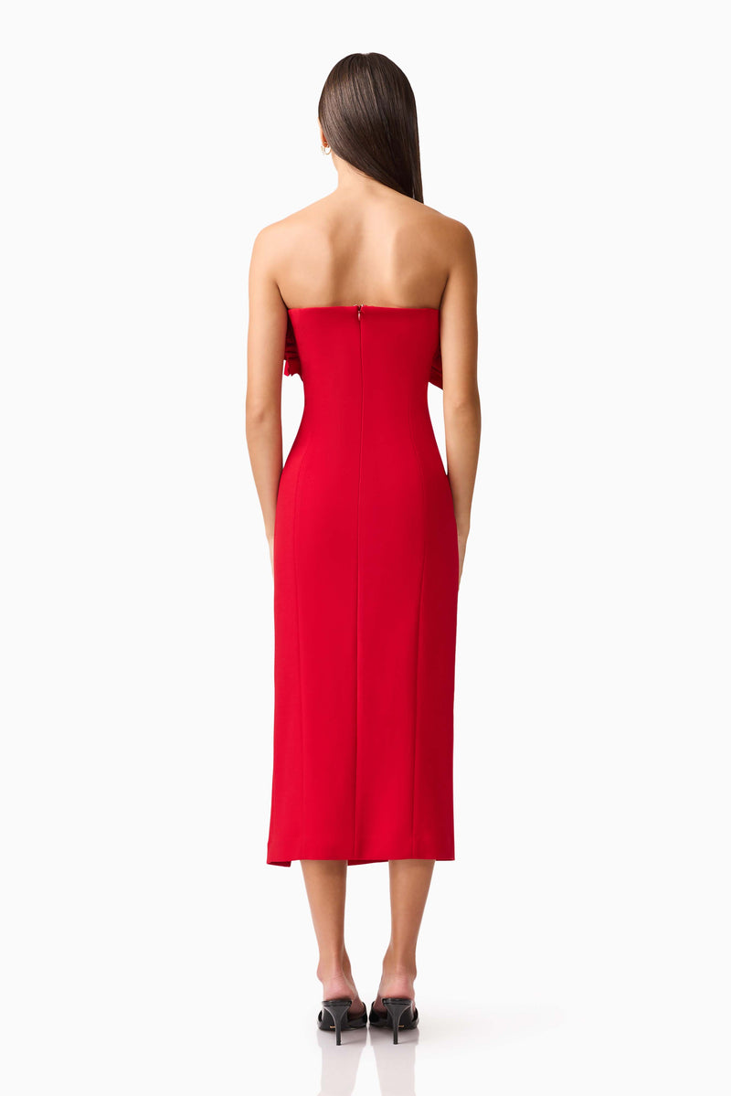 Brunette model wearing the Lila Fitted Midi Dress in Red back shot