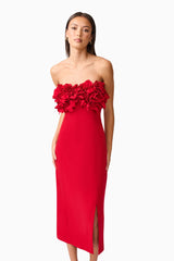 Brunette model wearing the Lila Fitted Midi Dress in Red close up posed shot