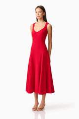 Brunette model wearing the Lila A-Line Midi Dress in Red side shot