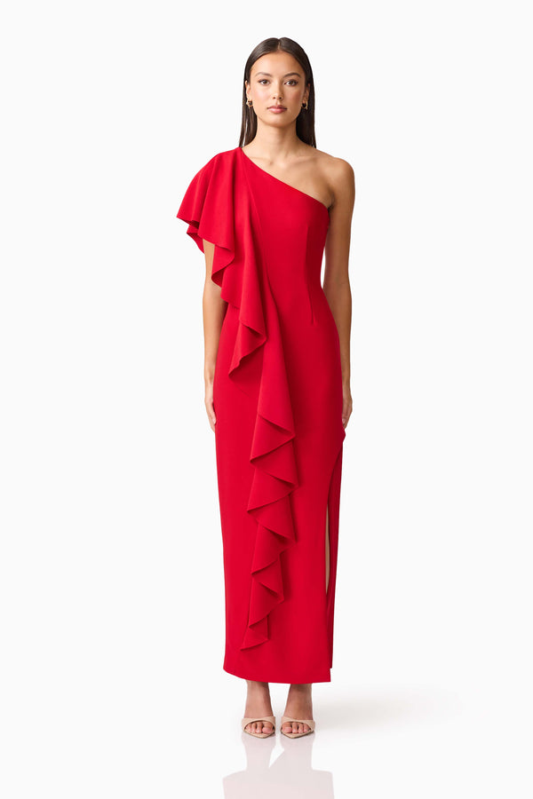 Brunette model wearing the Lila Asymmetrical Gown in Red front shot