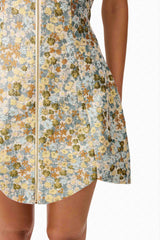 Brunette model wearing Tasmin Strapless Mini Dress in Blue & Yellow Floral detail shot 
