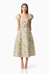 Brunette model wearing Tasmin Puff Sleeve Midi Dress in Blue & Yellow Floral Front Shot