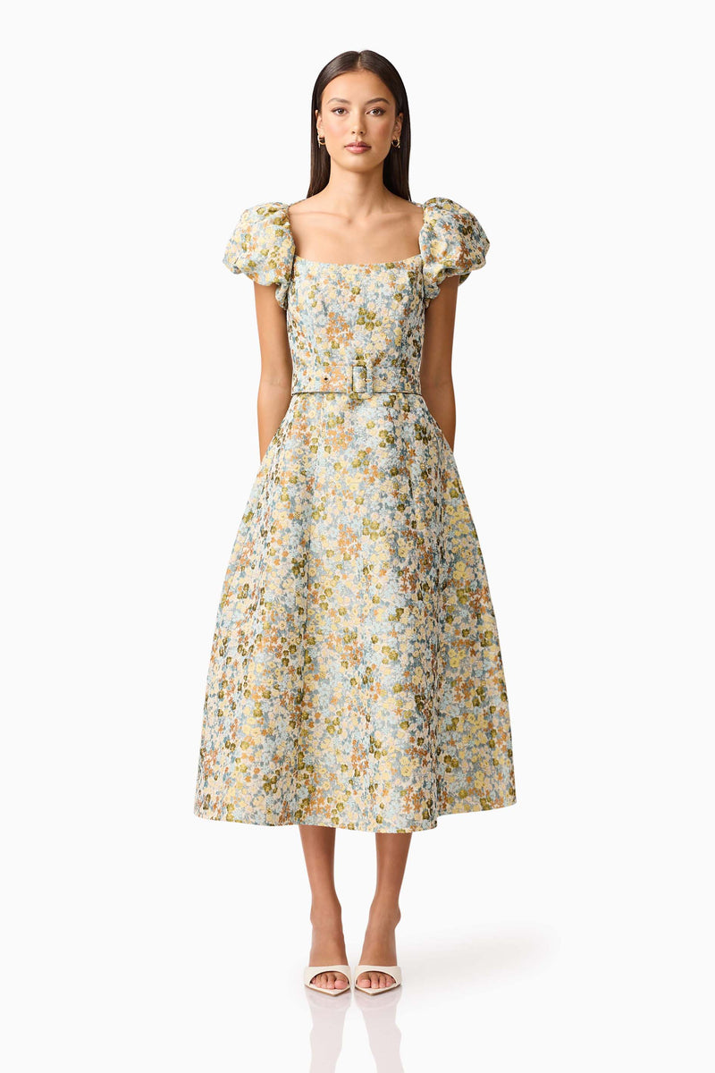 Brunette model wearing Tasmin Puff Sleeve Midi Dress in Blue & Yellow Floral Front Shot