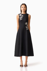Brunette model wearing the Soleil A-Line Midi Dress in Black Front Shot