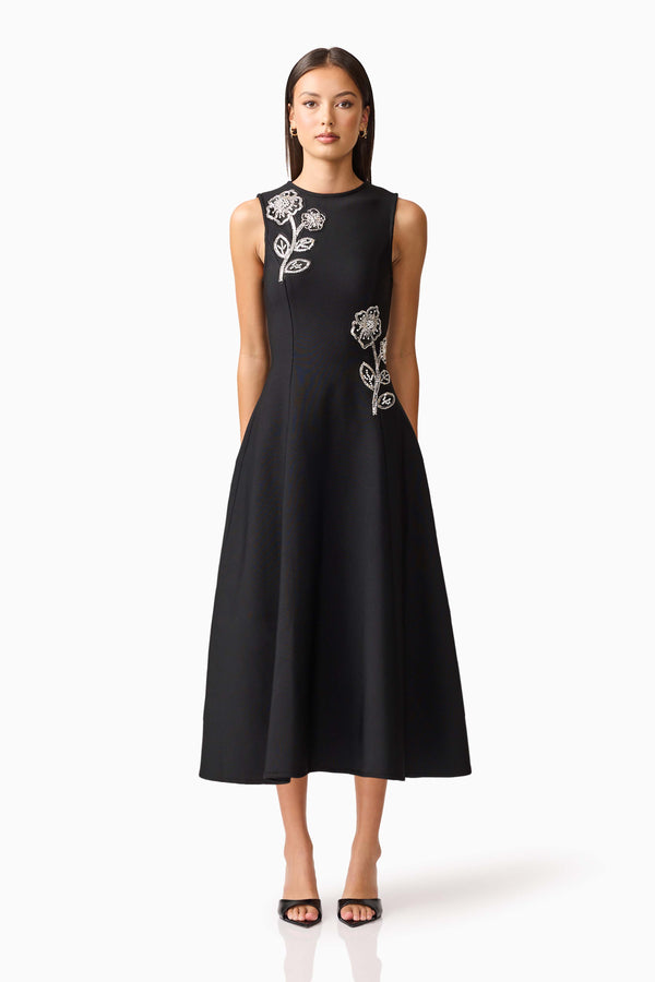 Brunette model wearing the Soleil A-Line Midi Dress in Black Front Shot