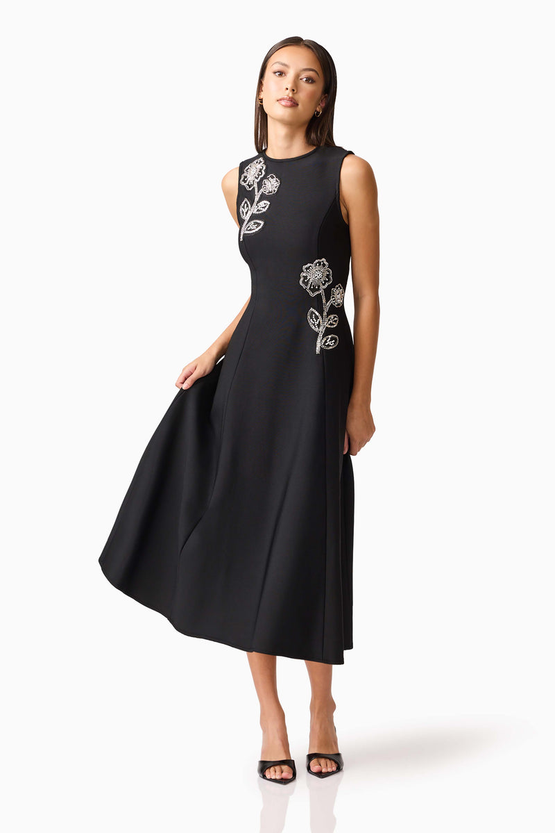 Brunette model wearing the Soleil A-Line Midi Dress in Black Posed Shot