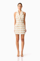 Brunette model wearing Ashlyn Halter Tweed Mini Dress in White & Gold front shot
